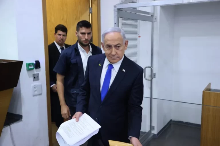 Israeli Prime Minister Benjamin Netanyahu attends his trial on corruption charges at the district court in Tel Aviv